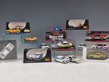 a lot of toy cars on display in a display case