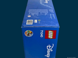 a blue box with a lego figure inside of it