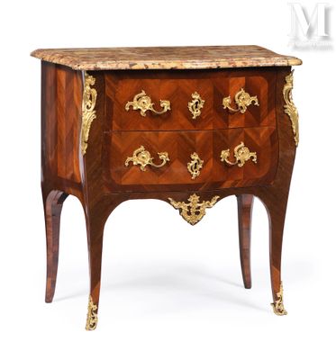 an antique chest of drawers with a marble top and gold decoration