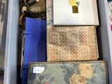 a lot of items in a box on the table