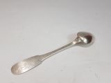 a spoon that is sitting on a table