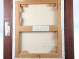 painting of a wooden easel with a picture frame on top of it