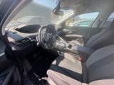 the interior of a car with a steering wheel and a dashboard