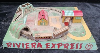 a model of a train station with a train on it