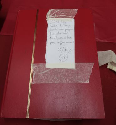a piece of paper on the table with a piece of paper attached to it