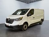 la photo d'une camionnette blanche garée dans un garage