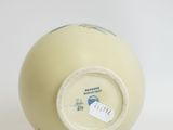 a white ball with a blue and white design on it