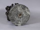 a stone object that is sitting on a table
