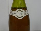 a bottle of wine that is sitting on a table