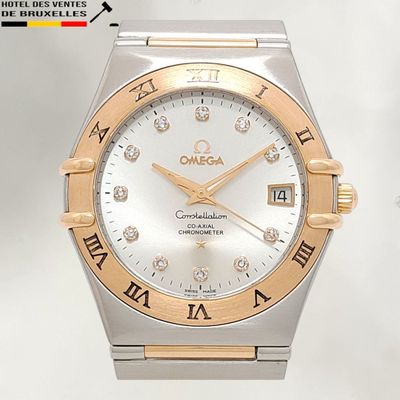 an image of a close up of a wrist watch with roman numerals