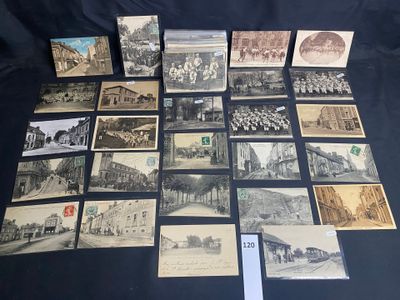 an old photo of a bunch of old postcards sitting on a table