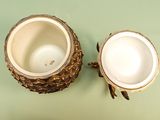 two bowls sitting next to each other on a table