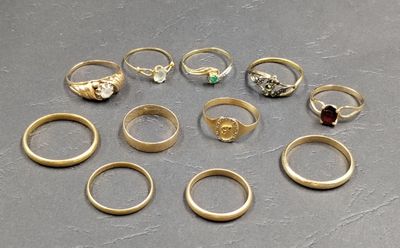 a lot of rings that are sitting on a table
