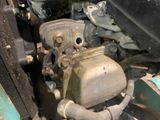 a close up view of a car engine with no fuel