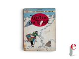 an old book with a picture of a man and a woman on a snow covered mountain