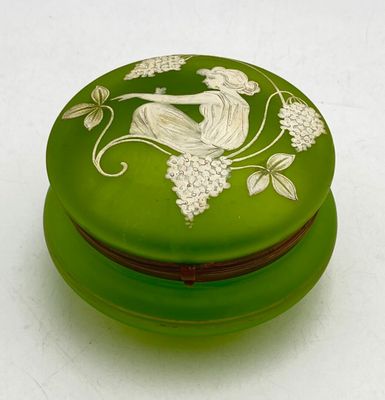 a green box with a picture of a woman on it