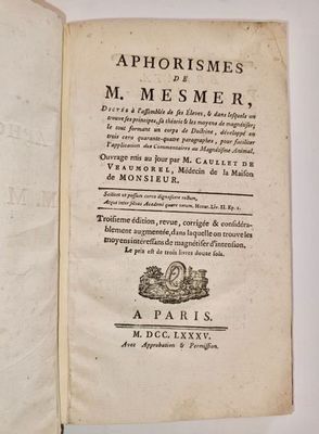 an open book with a picture of a bird on it