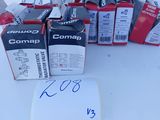 several boxes of commag products are sitting on a white surface