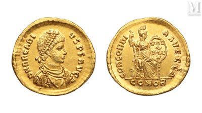 a gold coin with an image of a man on it