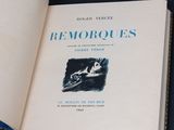 an open book with a picture of a boat on it