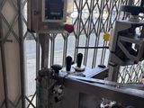 a machine that is sitting in front of a window