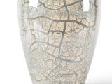 a vase that has a cracky surface on it