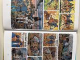 a picture of a comic book open on a table