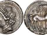 une pièce d'argent sur laquelle est représenté un cheval