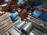 a pile of bricks and other items on a pallet