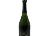 a bottle of champagne sitting on top of a white surface