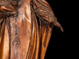 an image of a statue of a woman holding a child and a dog