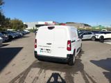 a white van that is parked in a parking lot