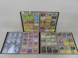 une pile de cartes pokemon posées les unes sur les autres