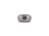 an image of a ring with a heart shaped black diamond on it