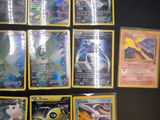 a lot of pokemon cards that are on the wall