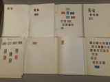 a lot of stamps on the pages of a book