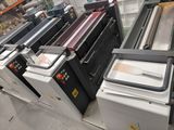 a lot of machines that are sitting on the floor