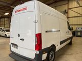 a white van that is parked in a garage