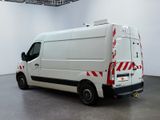 a white van with red stripes parked in a room