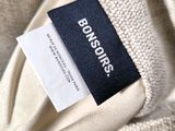 an image of a close up of a label on a sweater