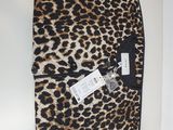 a leopard print scarf hanging on a wall