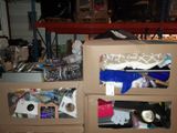 two boxes with items in them sitting on the floor