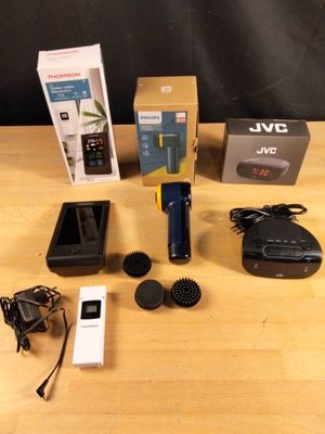 Lot de radio réveil JVC, station météo Thomson, et nettoyeur…