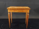 a small wooden table with a drawer on one side and a drawer on the other