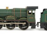 a toy train that is sitting on a white surface