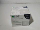 un tube de dentifrice posé sur une table