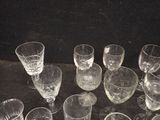 a lot of empty wine glasses sitting on a table