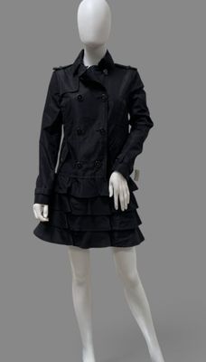 an image of a mannequin wearing a black dress and coat