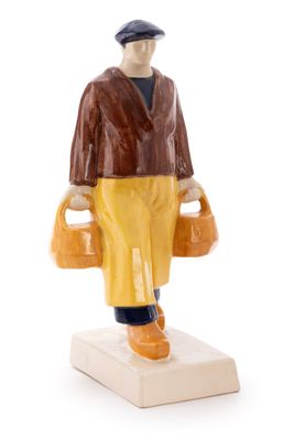 an image of a figurine of a man holding two buckets