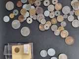 a lot of coins that are sitting on a table